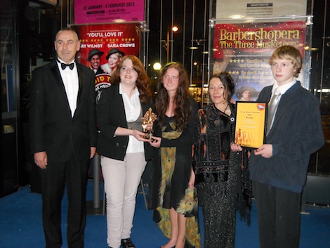 The team receive the award at the Theatre Royal